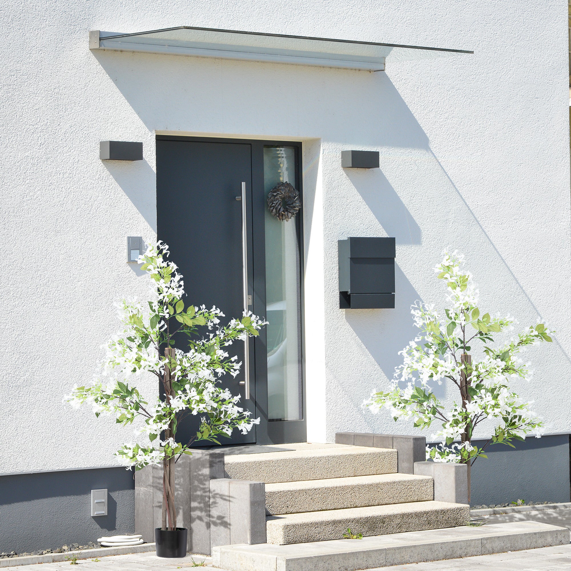 Set of 2 Artificial Honeysuckle Plants with Curved Boots - White